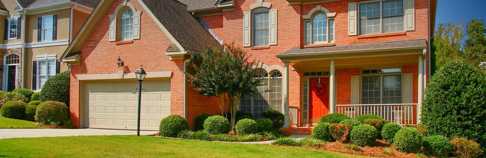 brick home exterior, front yard